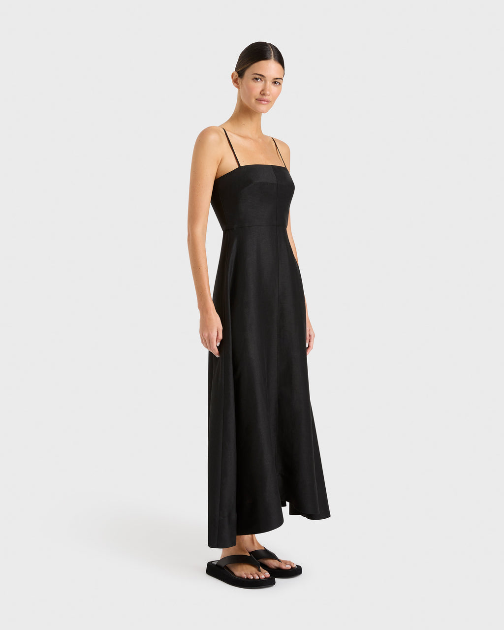 https://cdn.shopify.com/s/files/1/1799/6477/files/BONDI_BORN_Bormio_Flared_Dress_Black_Sidecopy.jpg?v=1748029764