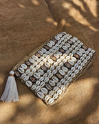 Celeste Raffia Large Cowrie Shell Clutch Latte Handwoven Beach Accessory