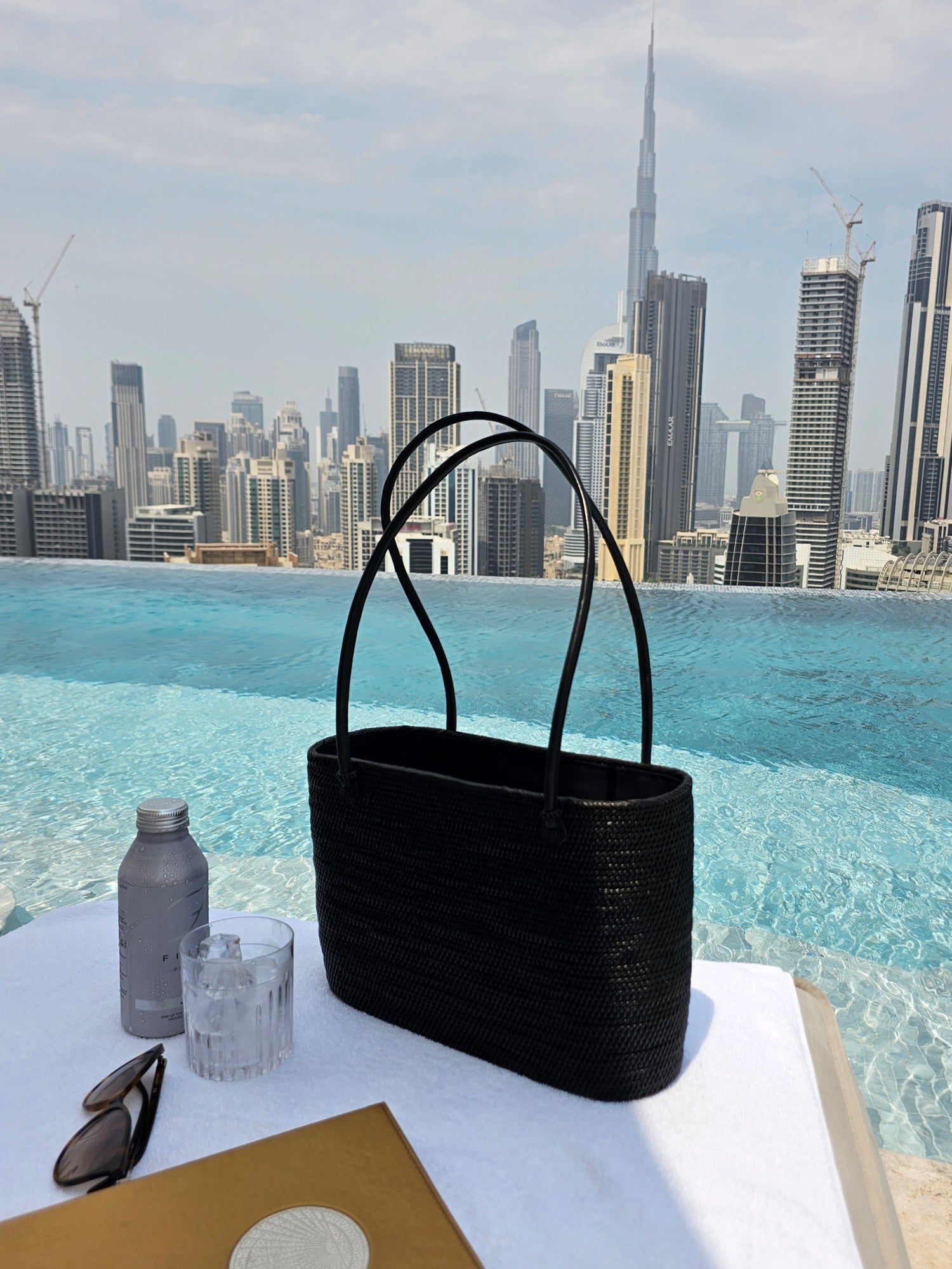 Handwoven Chestnut Rattan Bucket with Leather Handles and Cotton Lining