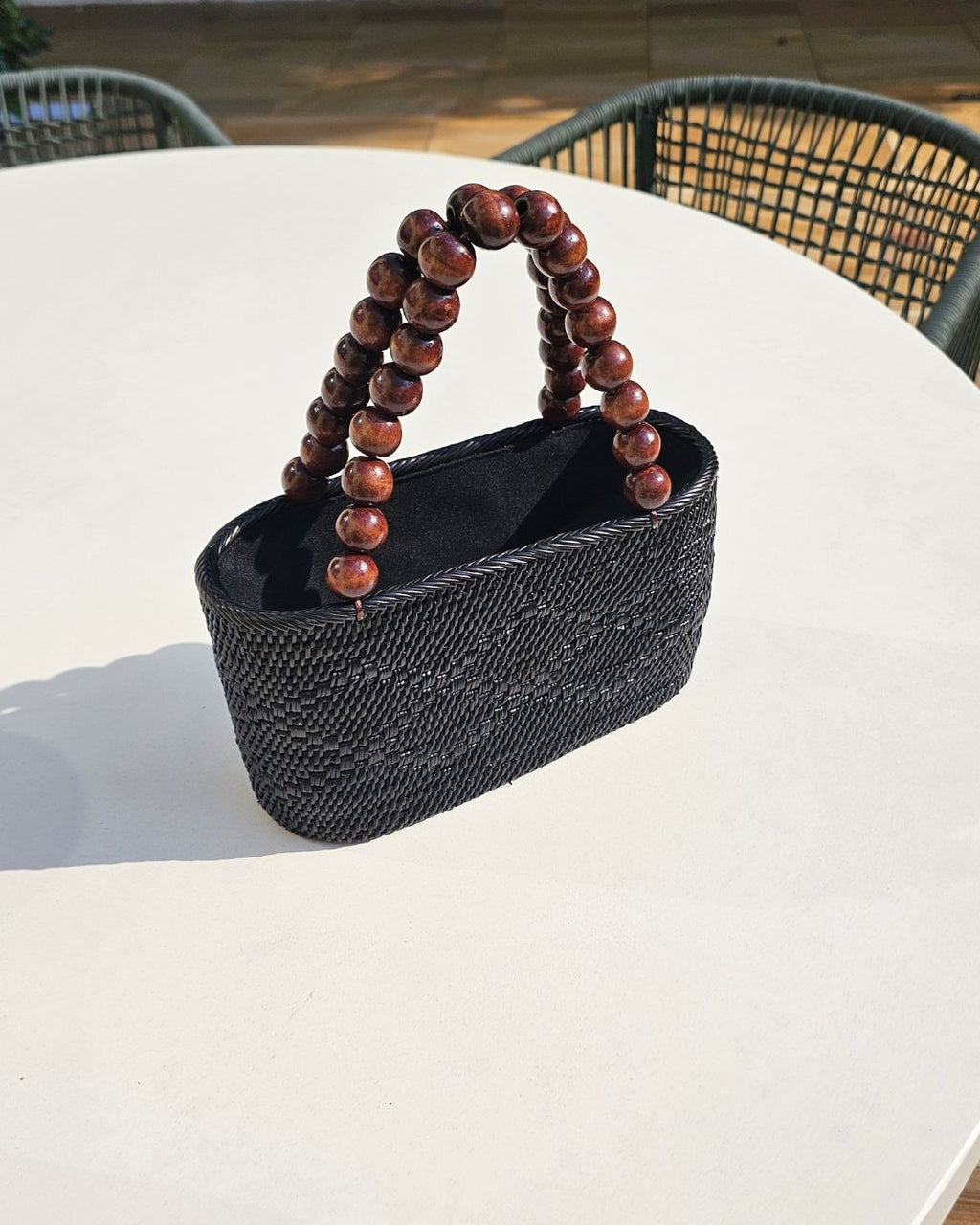 https://oh-sun.com/wp-content/uploads/2025/05/Lucia-Rattan-And-Wooden-Bead-Tote-Black-2.jpg