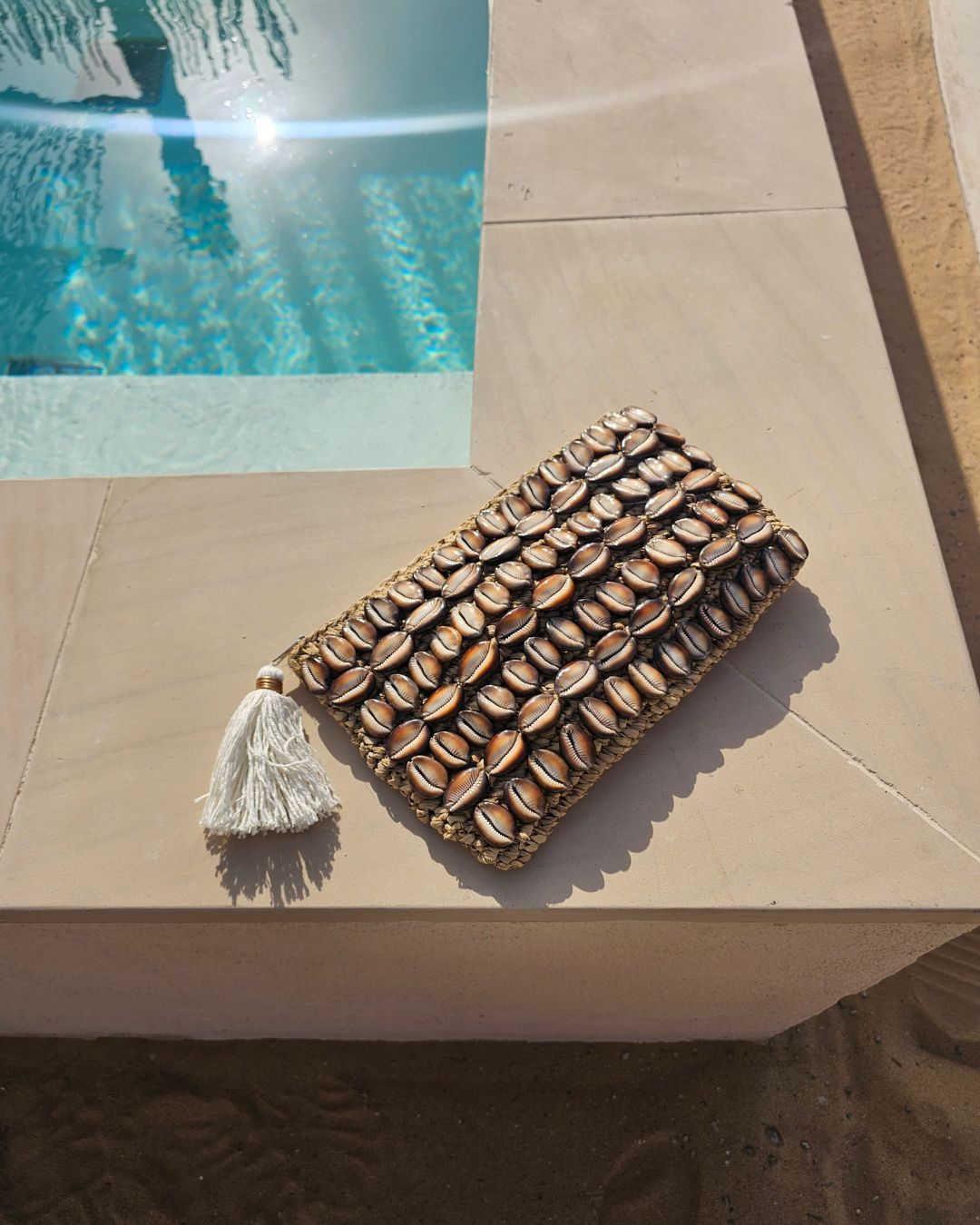 Celeste Raffia Large Cowrie Shell Clutch Brown Handwoven Summer Accessory