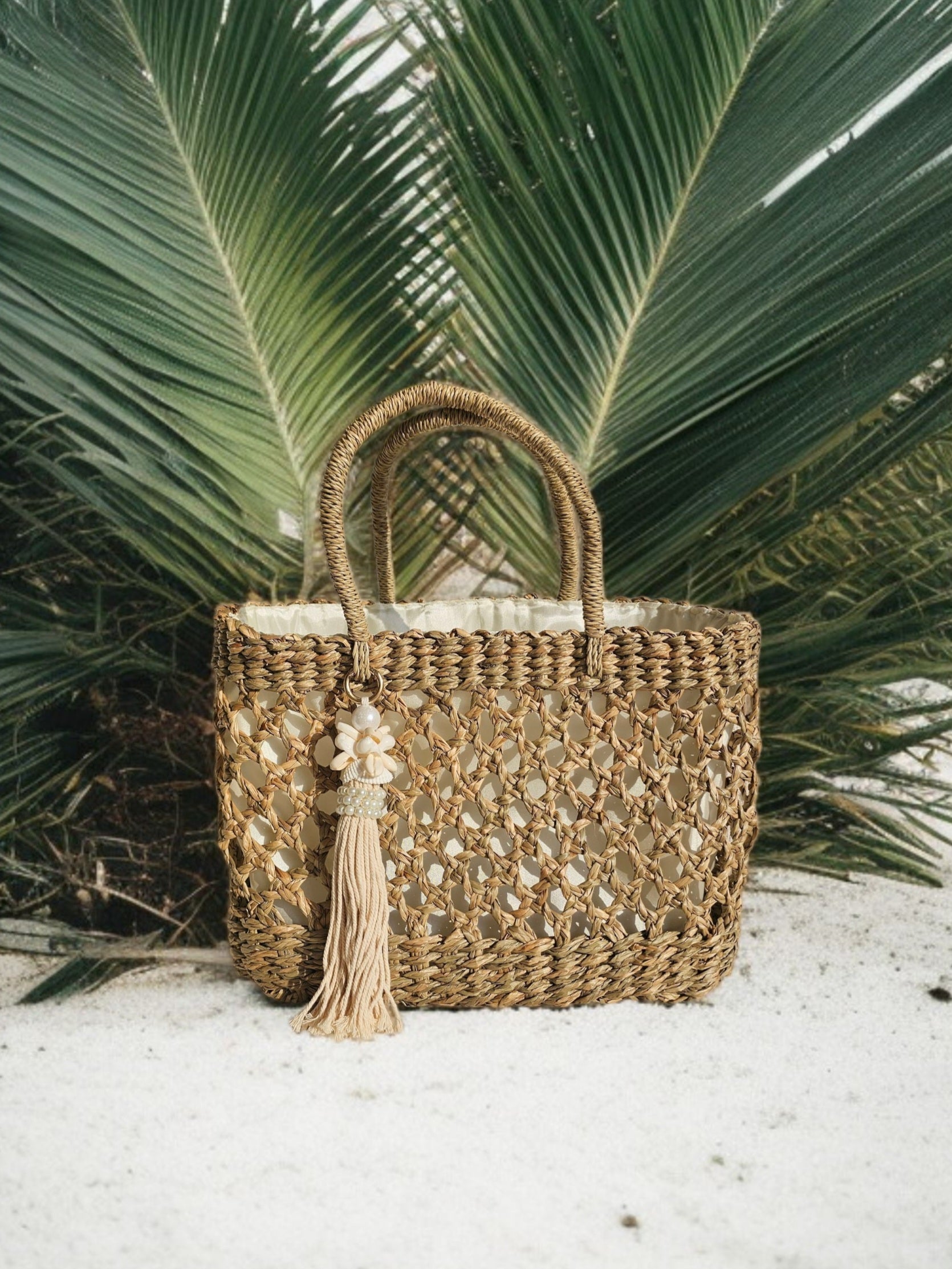 Handwoven Balinese Straw Tassel Tote with Satin Lining and Drawstring