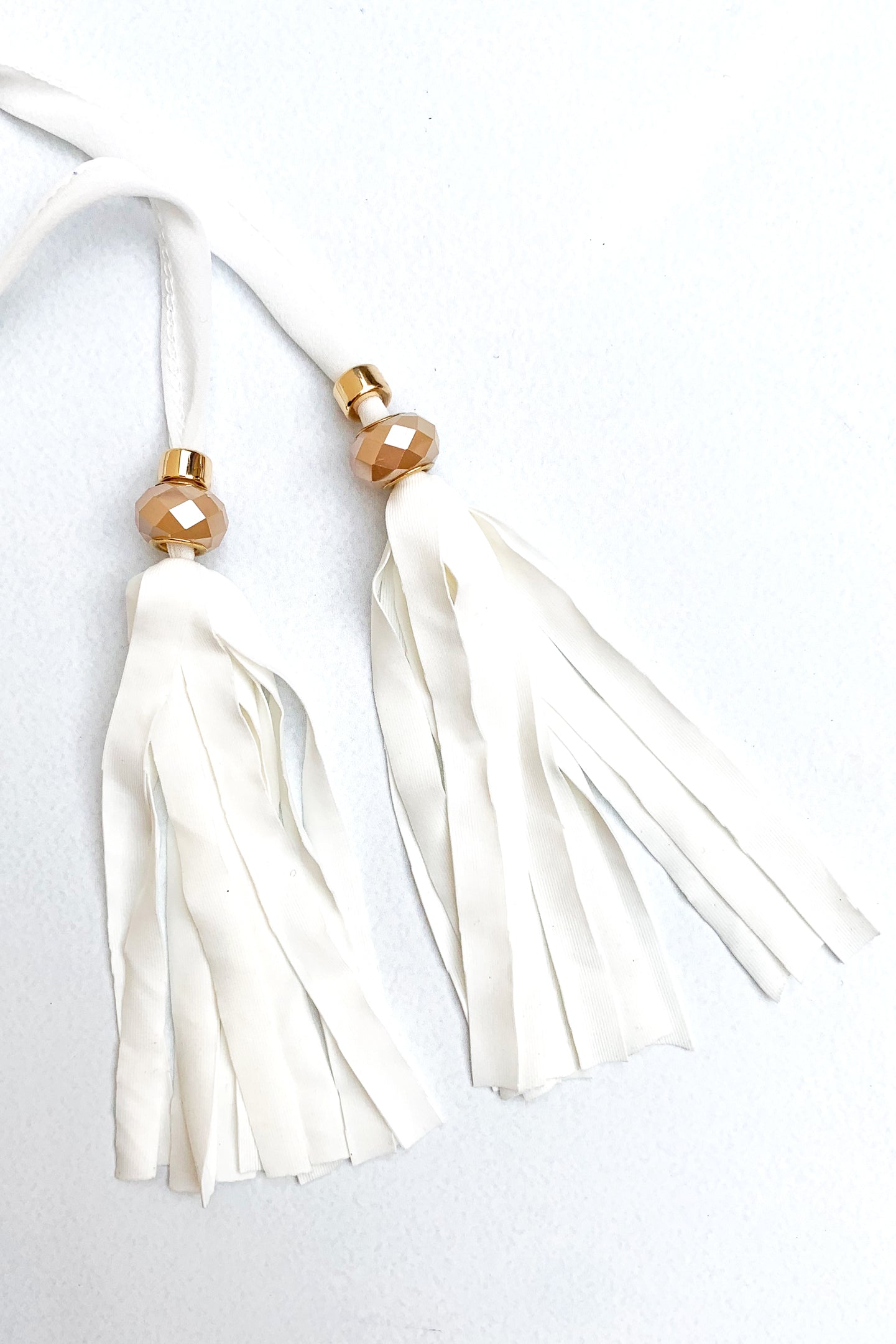 White Metallic Knit Open-Front Coverup with Tassels and Metallic Thread