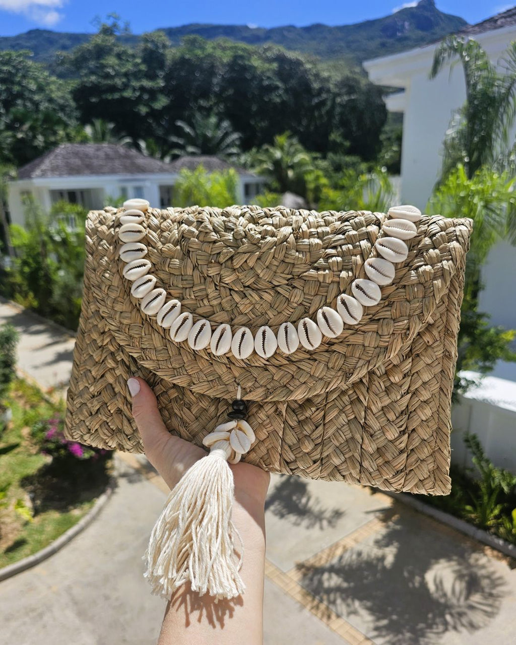 Xena Cowrie Shell Clutch Handwoven Balinese Straw Tassel Cotton Lining