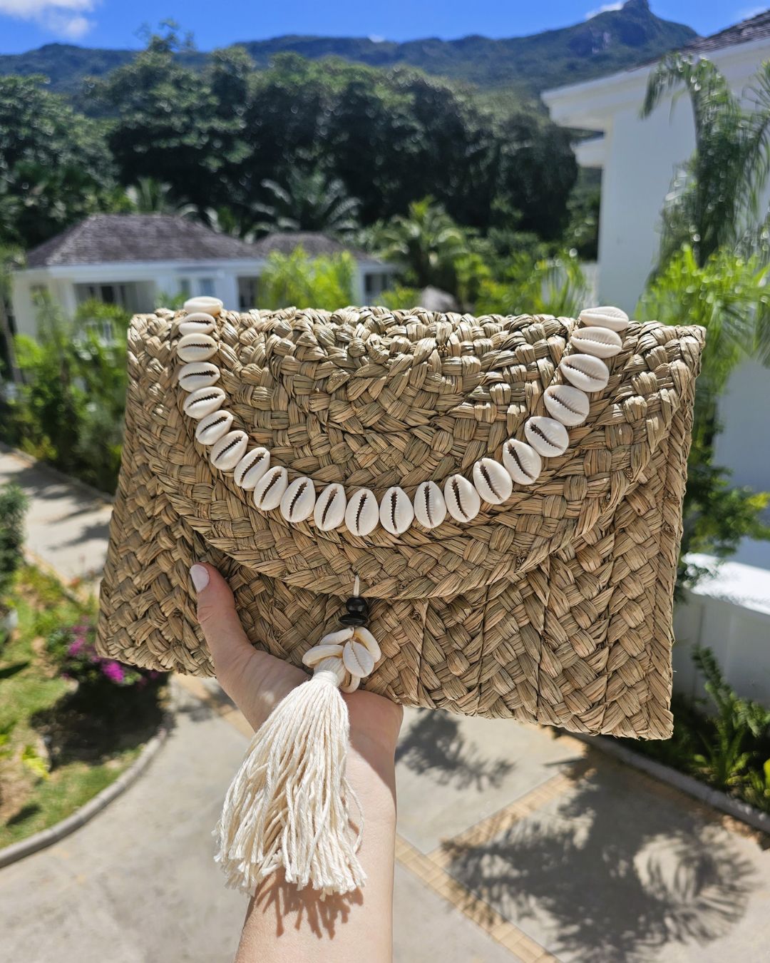 Xena Cowrie Shell Clutch Handwoven Balinese Straw Tassel Cotton Lining