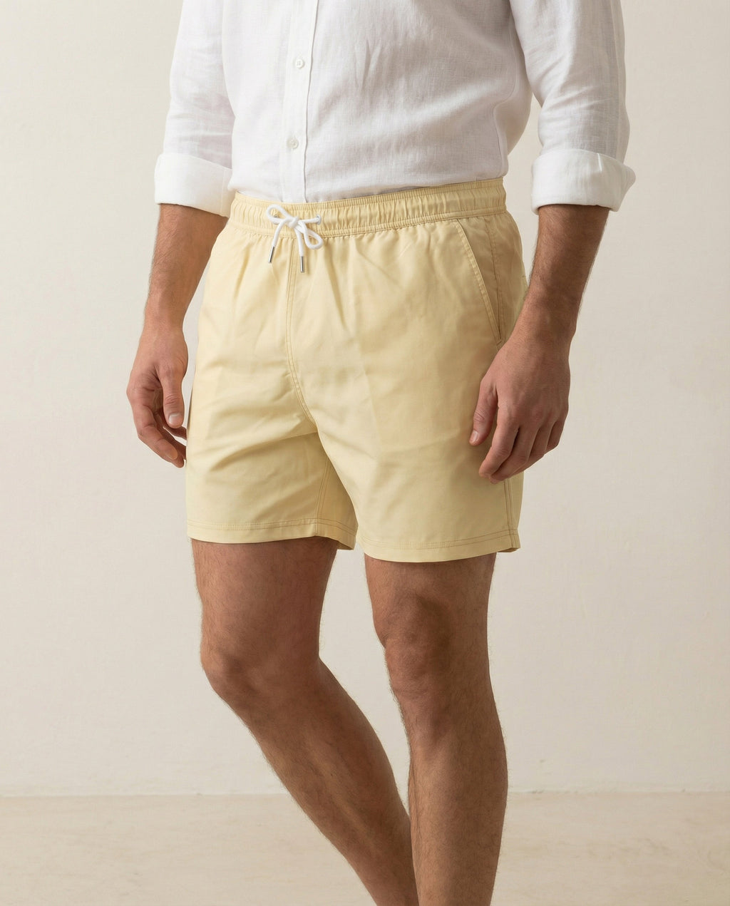 https://cdn.shopify.com/s/files/1/0614/1529/3146/files/apprivio-lumari-swim-shorts-light-yellow-front-pocket-detail.jpg?v=1771369794