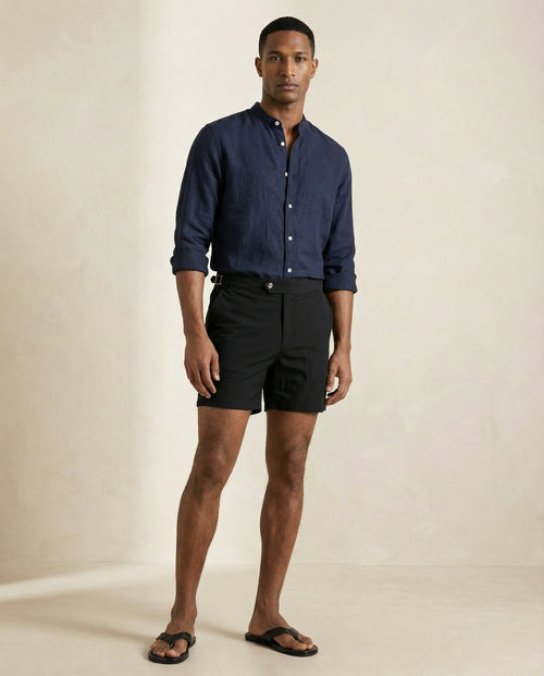 https://cdn.shopify.com/s/files/1/0614/1529/3146/files/apprivio-riviera-swim-shorts-black-full-body.jpg?v=1771369758