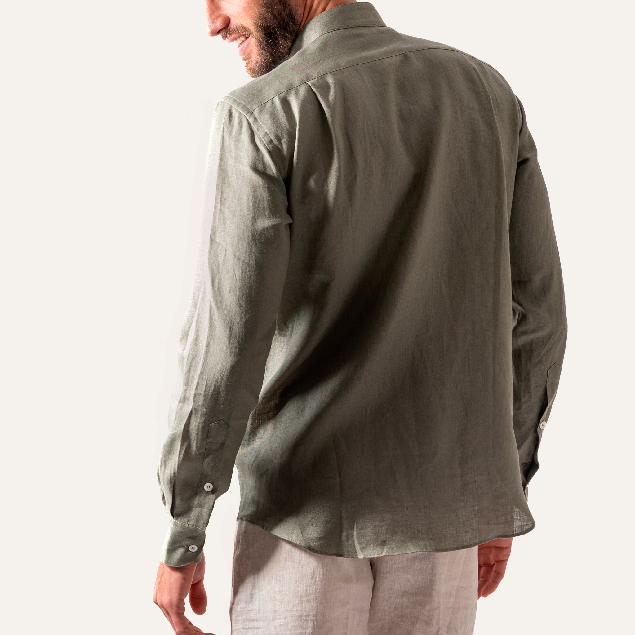 https://cdn.shopify.com/s/files/1/0853/1227/4697/files/casual_linen_shirts_olive_green_indossato_back_b2818d54-15df-4159-97ae-9df03e0d1f13.jpg?v=1741948801