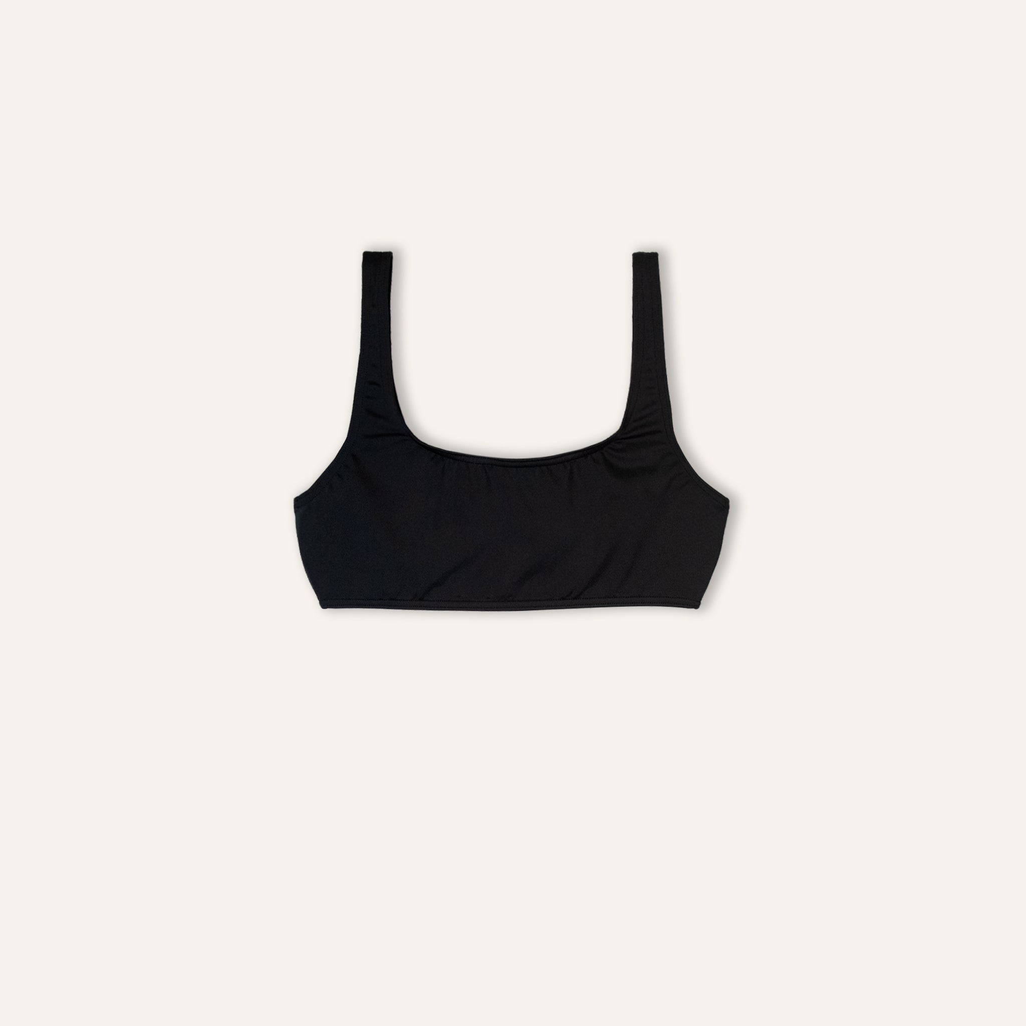 https://cdn.shopify.com/s/files/1/0853/1227/4697/files/k-a-m-p-o-s-crop-top-black-626128.jpg?v=1741947096