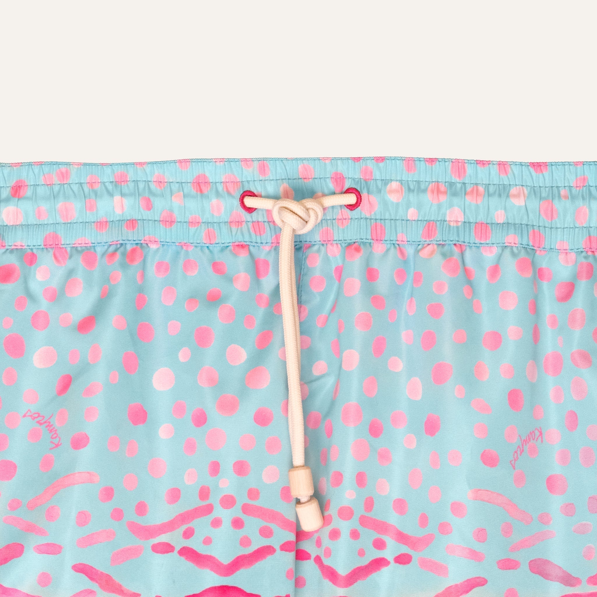 https://cdn.shopify.com/s/files/1/0853/1227/4697/files/k-a-m-p-o-s-swim-shorts-parrot-fish-278555.jpg?v=1741948206