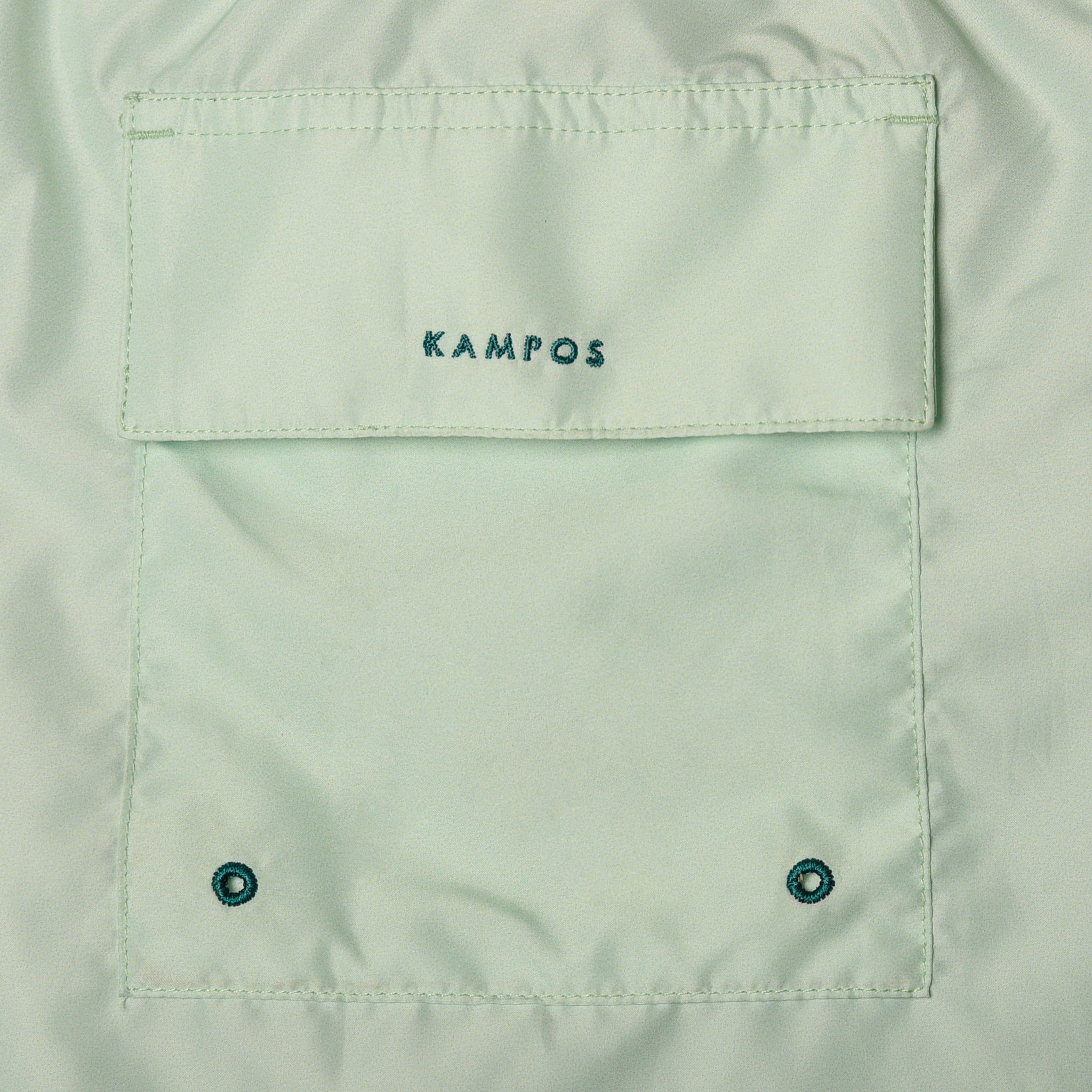 https://cdn.shopify.com/s/files/1/0853/1227/4697/files/k-a-m-p-o-s-swim-shorts-sage-117980.jpg?v=1741947329