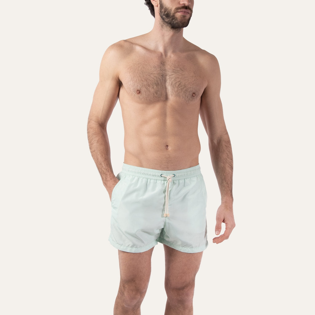 https://cdn.shopify.com/s/files/1/0853/1227/4697/files/k-a-m-p-o-s-swim-shorts-sage-979938.jpg?v=1741947329