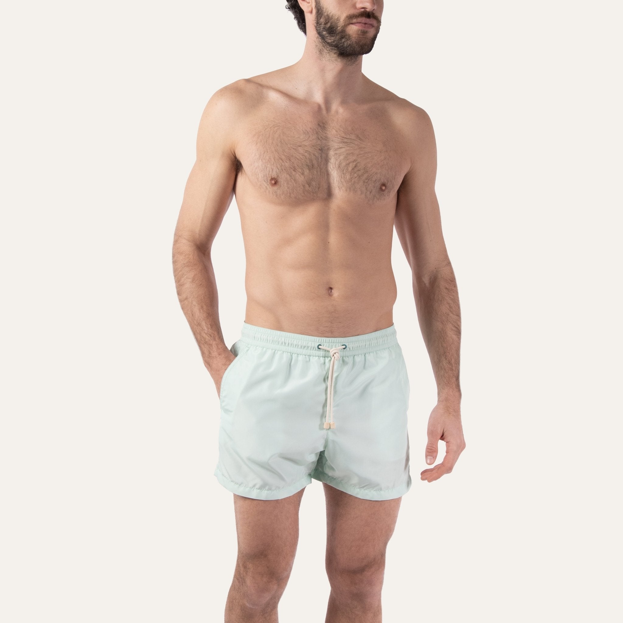 https://cdn.shopify.com/s/files/1/0853/1227/4697/files/k-a-m-p-o-s-swim-shorts-sage-979938.jpg?v=1741947329