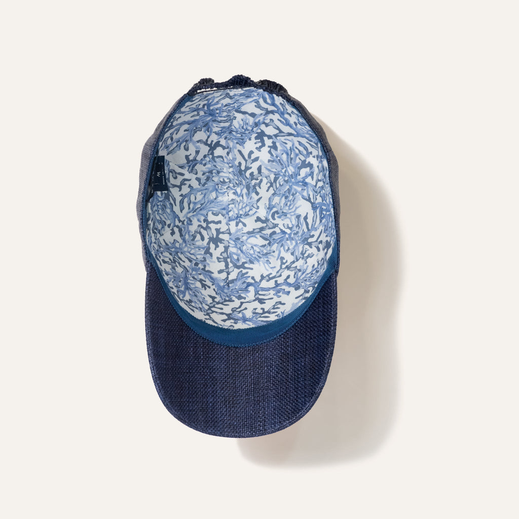 https://cdn.shopify.com/s/files/1/0853/1227/4697/files/kampos-baseball-hat-rafia-navy-584352_5a24f30b-e962-43cb-a0eb-7692482de851.jpg?v=1741947654