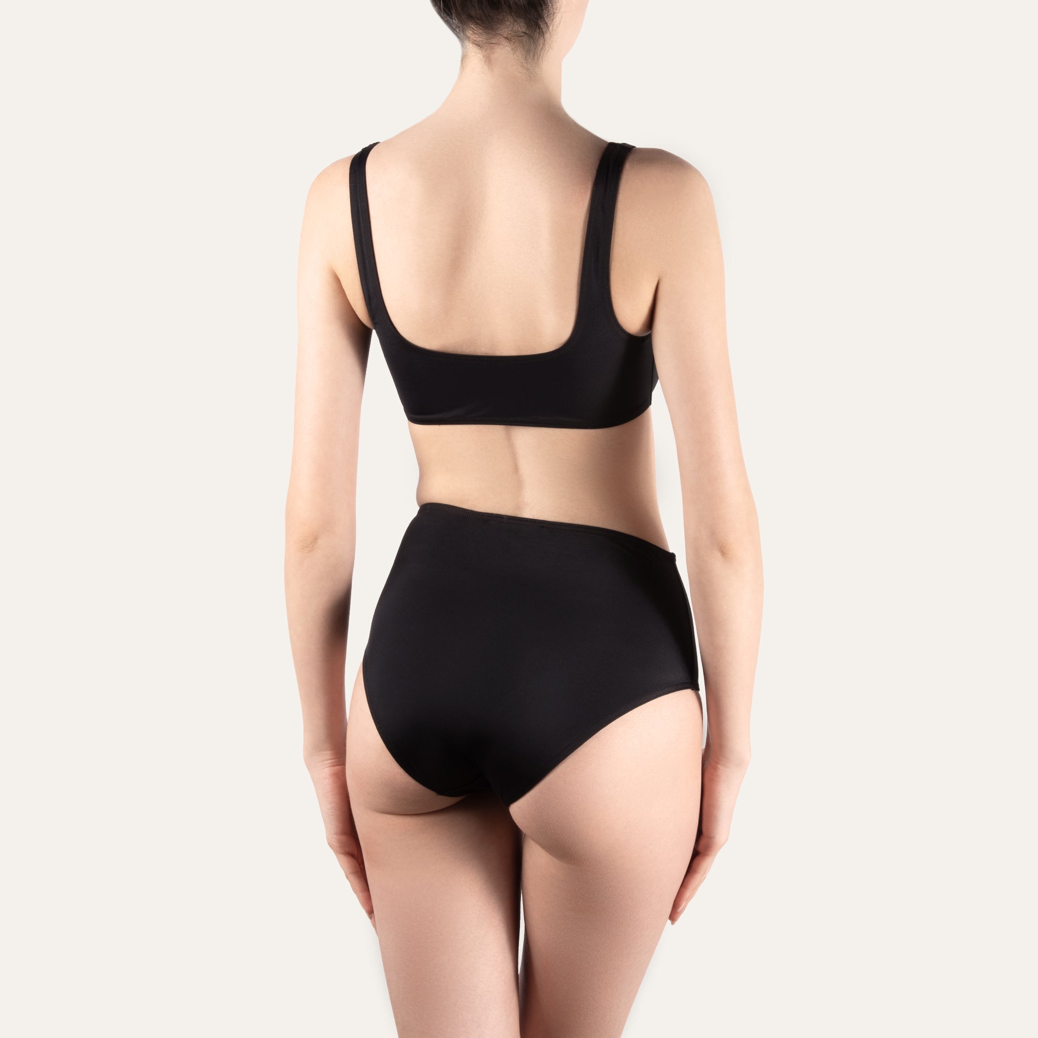 https://cdn.shopify.com/s/files/1/0853/1227/4697/files/kampos-high-waist-slip-black-796382.jpg?v=1741946768