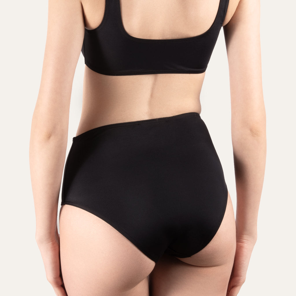 https://cdn.shopify.com/s/files/1/0853/1227/4697/files/kampos-high-waist-slip-black-844896.jpg?v=1741946768