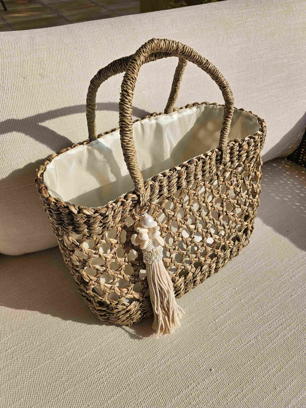 Handwoven Balinese Straw Tassel Tote with Satin Lining and Drawstring